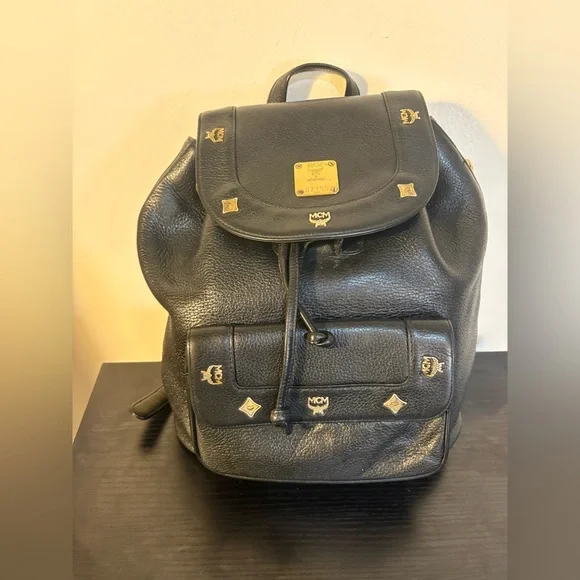 MCM Black Leather Backpack with Gold Accents and draw strings 12"x11" - Picture 2 of 16